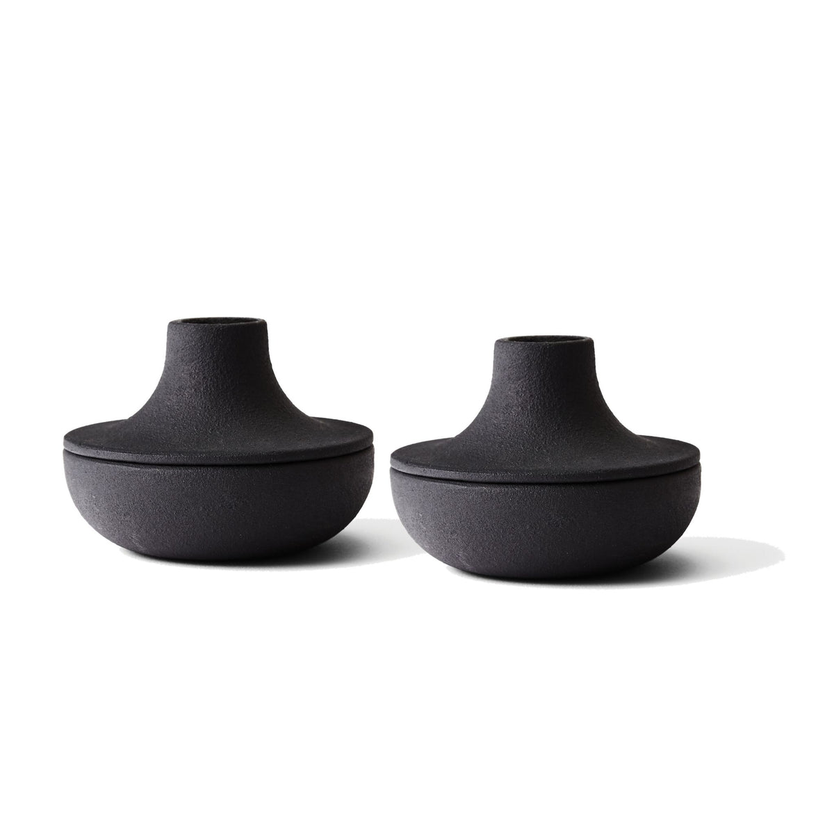 Cast Iron Candle Holders by Josh Owen