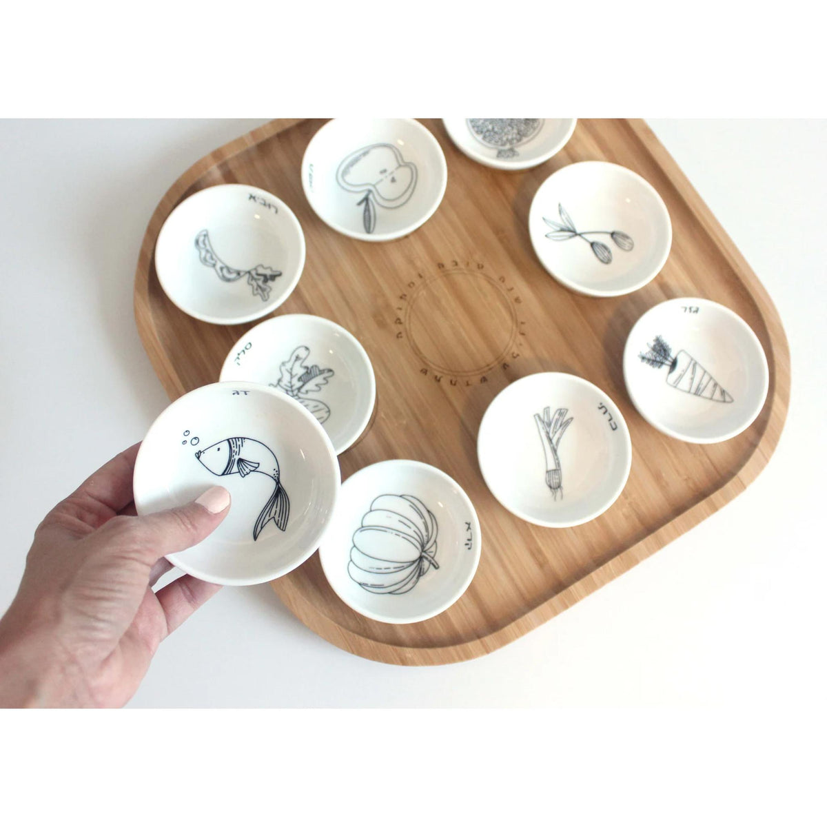Modern Rosh Hashana Seder Plate with Black and White Illustrations by Mickala Design