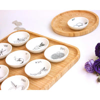 Modern Rosh Hashana Seder Plate with Black and White Illustrations by Mickala Design