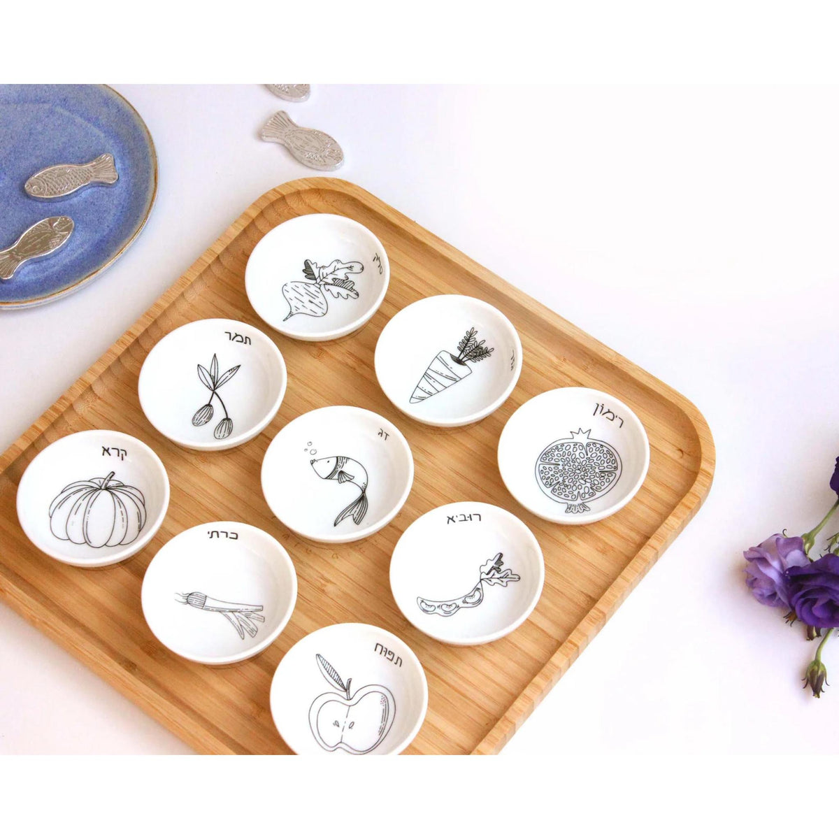 Modern Rosh Hashana Seder Plate with Black and White Illustrations by Mickala Design