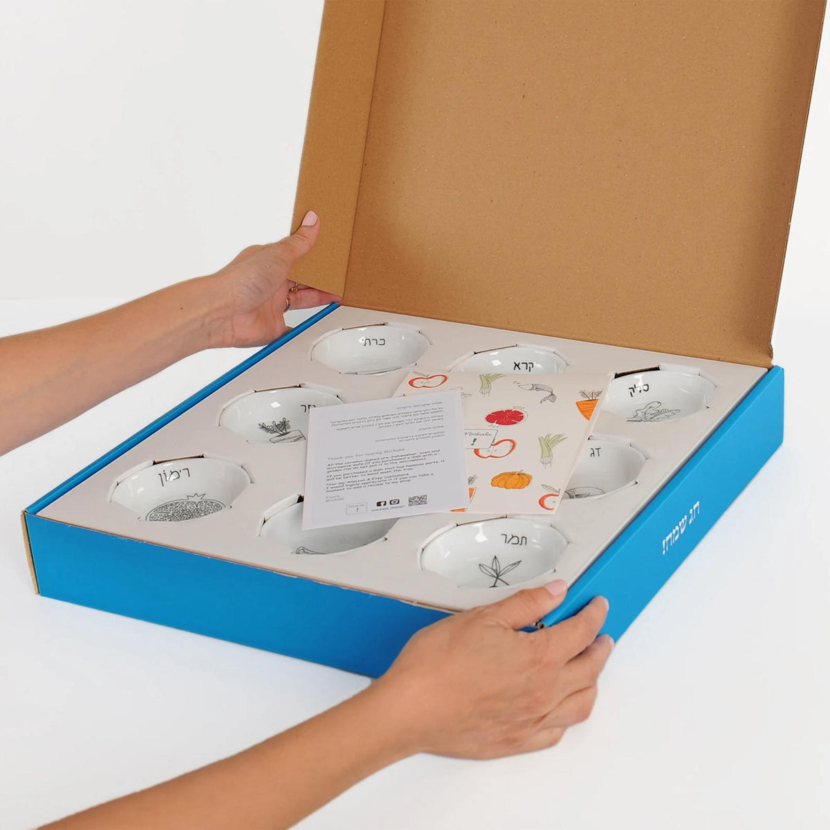 Modern Rosh Hashana Seder Plate with Black and White Illustrations by Mickala Design