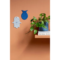 Handmade Ceramic Hamsa with Blue Spiral by Maiyan