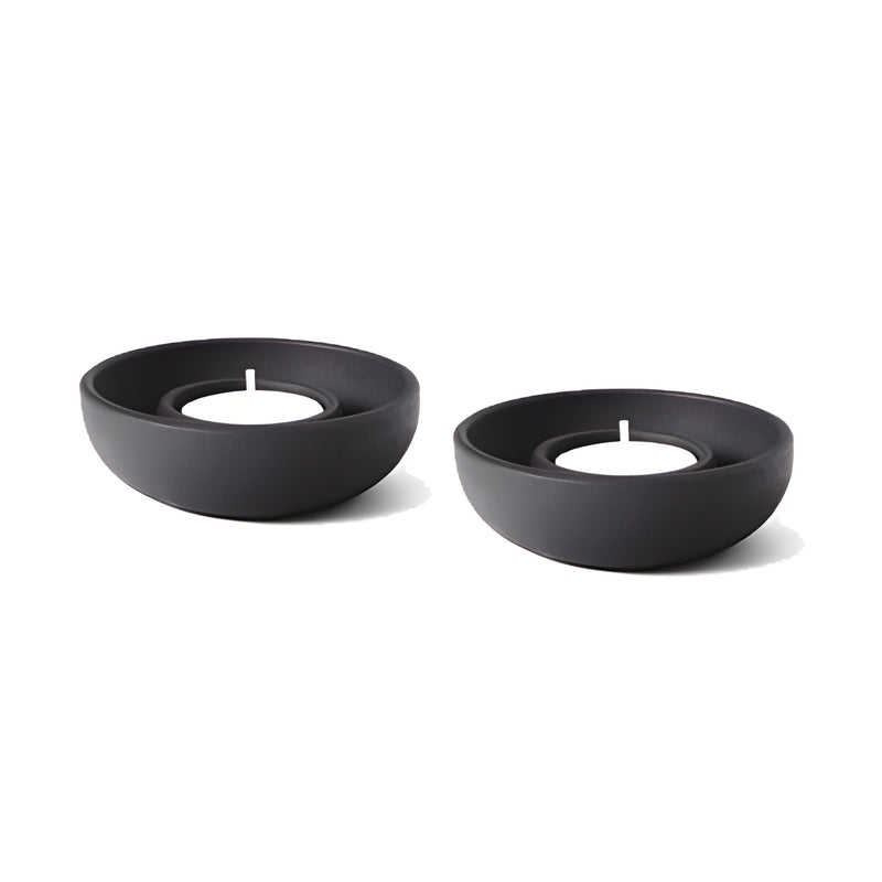 Cast Iron Candle Holders by Josh Owen