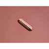 Pill Mezuzah in Rose Gold by Tchotchke