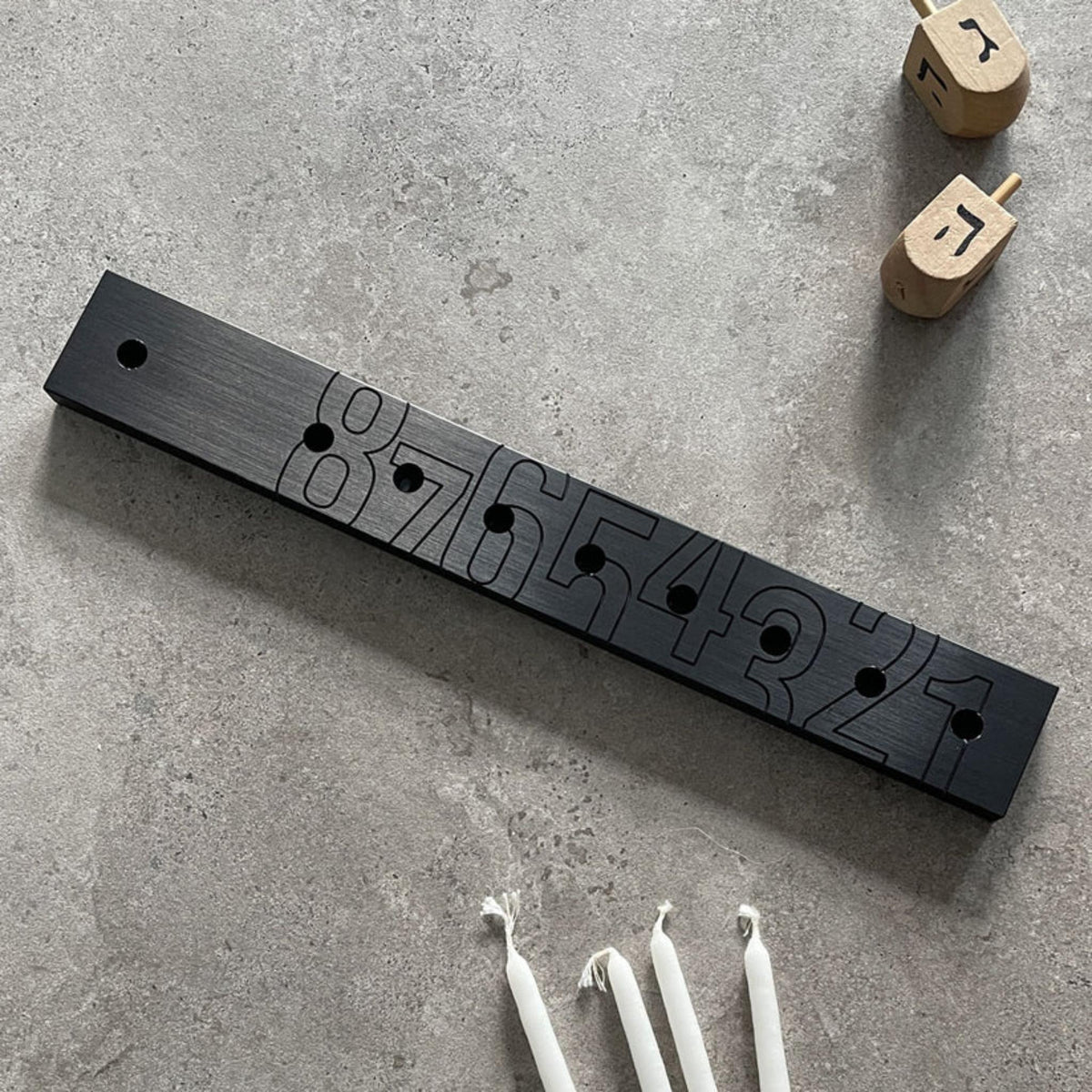 'Numbers' Chanukiah in Black Aluminium by Kariniti