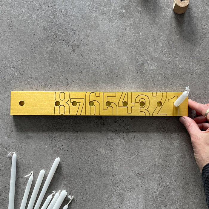 'Numbers' Chanukiah in Gold Aluminium by Kariniti