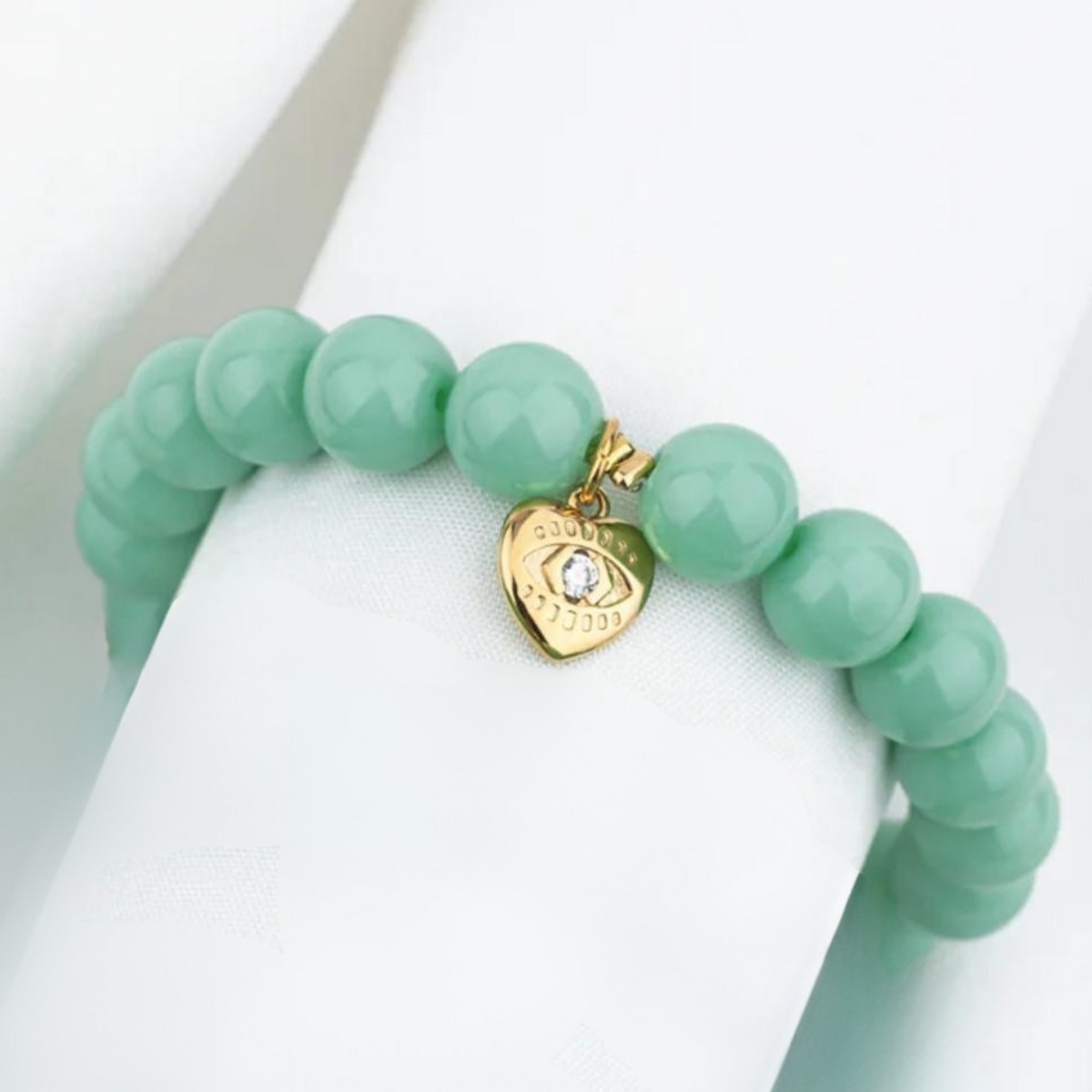 Aqua Beads Bracelet with Heart/Eye or Sun/Eye drop Charm Pendant in Gold by Shlomit Ofir