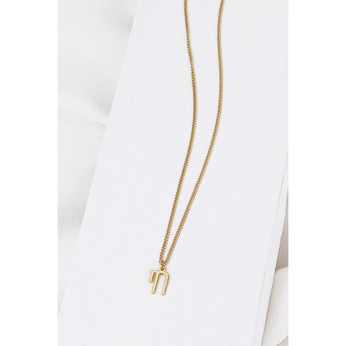 Unisex Chai Necklace in Gold by Shlomit Ofir